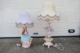 Two decorative, ceramic base, figural table lamps, largest approximately 118 cm (h). [2].