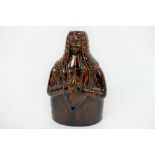 Brougham Reform Cordial stoneware flask, modelled as Lord Brougham holding a scroll,