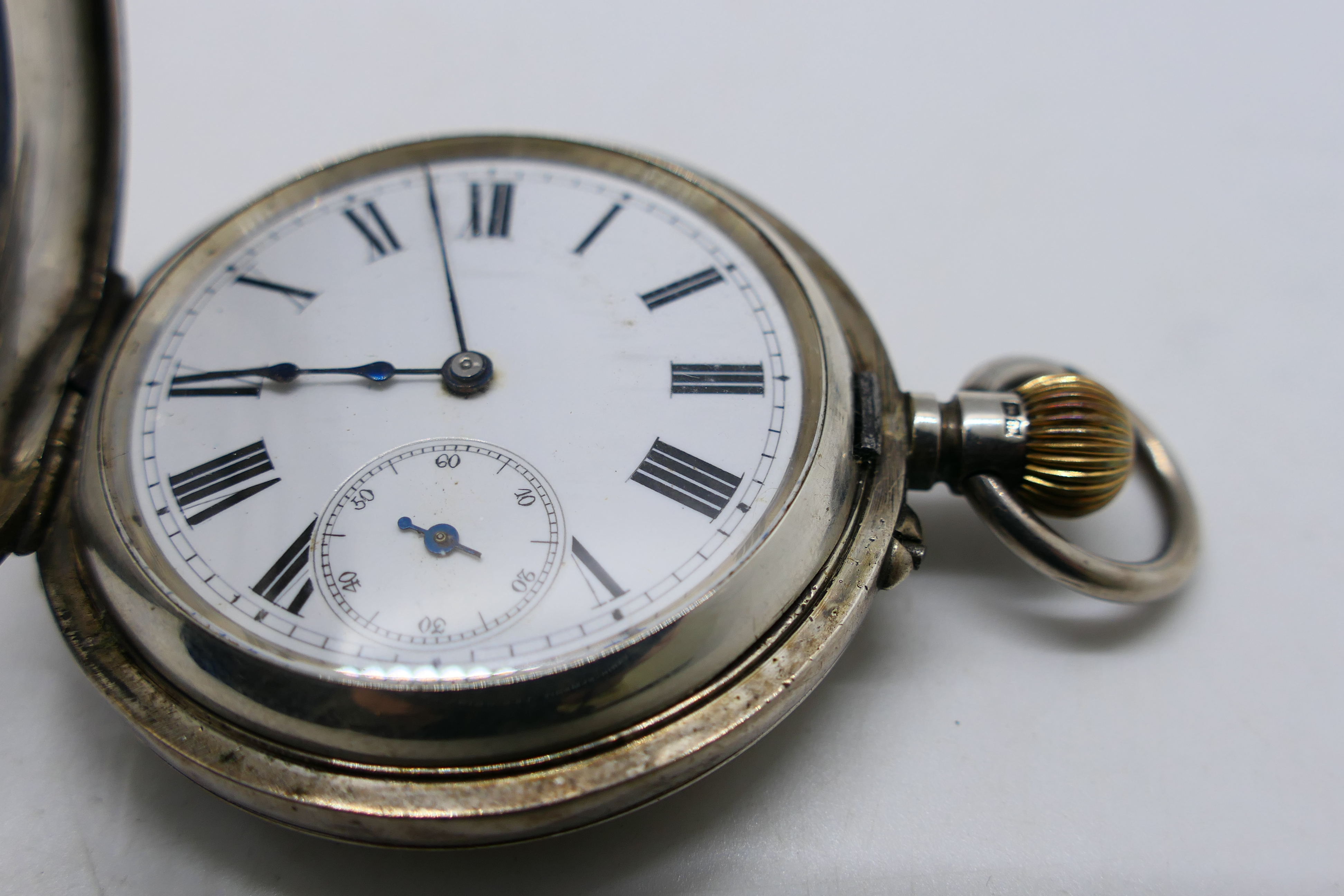 A Victorian silver half hunter pocket watch with Roman numerals to a white enamel dial, - Image 8 of 8