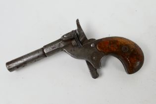 Antique single shot pocket pistol / muff gun with wooden grip (obsolete calibre) Sold as an exempt