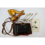 A meerschaum pipe contained in fitted case, vintage camera and plated spoons.