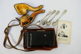 A meerschaum pipe contained in fitted case, vintage camera and plated spoons.