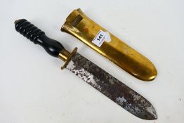 A vintage divers knife with flat brass scabbard and ebonite handle, 20 cm (l) blade,