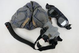 An RAF Helmet Flying G Type, size 4, with goggles and oxygen mask.