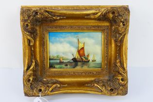 A small maritime print housed in an ornate gilt wood frame, frame 27 cm x 32 cm.