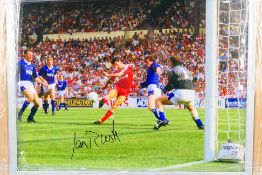 Signed Football Memorabilia - A photographic print depicting Ian Rush shooting on goal for