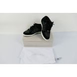 A pair of Jimmy Choo Miami trainers, black with rainbow glitter, size 37.