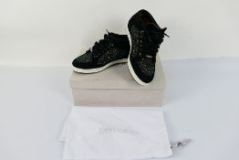 A pair of Jimmy Choo Miami trainers, black with rainbow glitter, size 37.