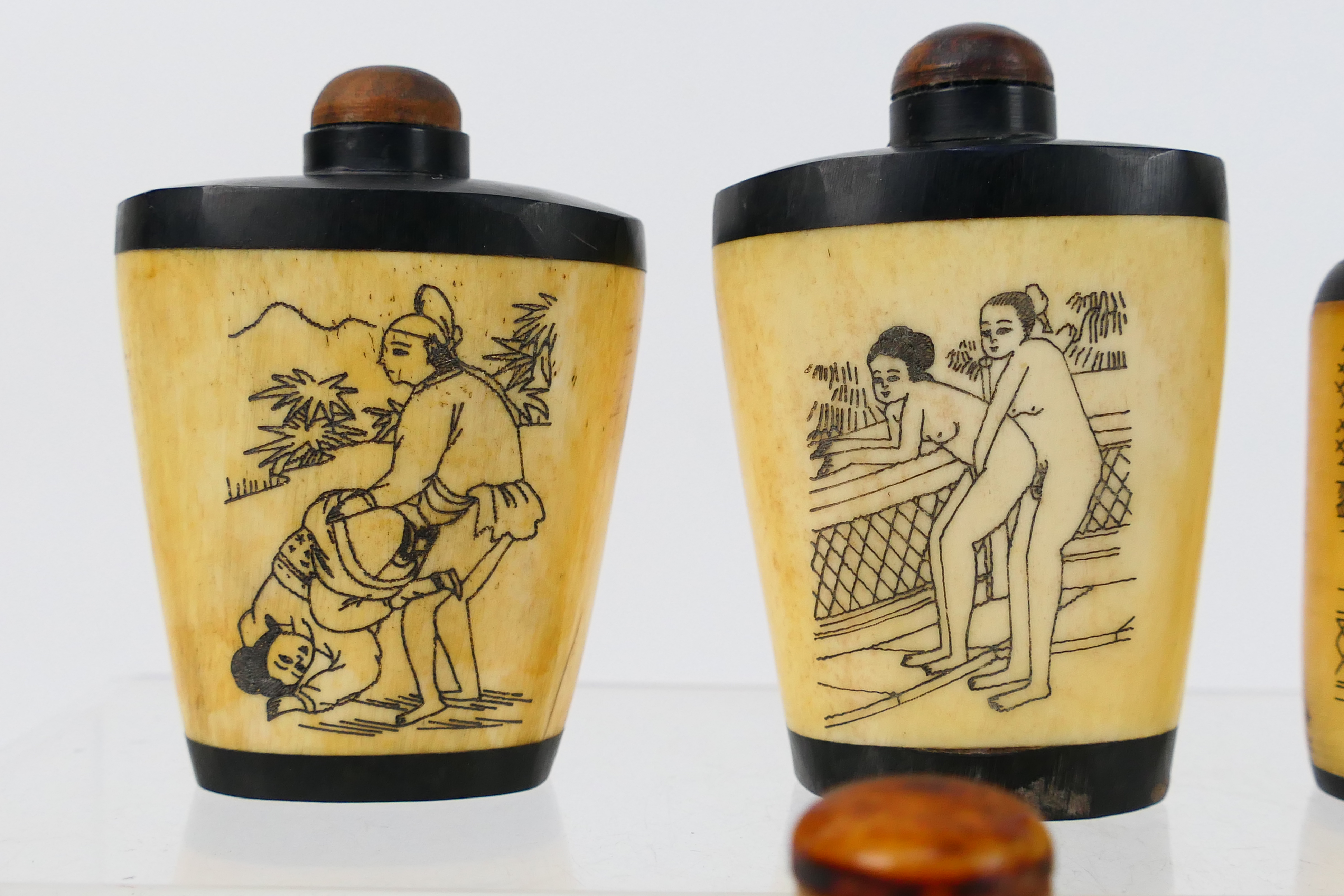 A grouping of bone and horn snuff bottles, four decorated with erotic scenes. [W]. - Image 2 of 7