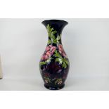 Moorcroft Pottery - A very large Moorcroft Pottery, floor standing baluster vase with flared rim,
