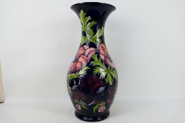 Moorcroft Pottery - A very large Moorcroft Pottery, floor standing baluster vase with flared rim,