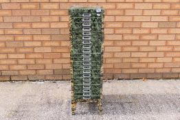 A 21 drawer metal cabinet decorated with military images to the top and drawer fronts and