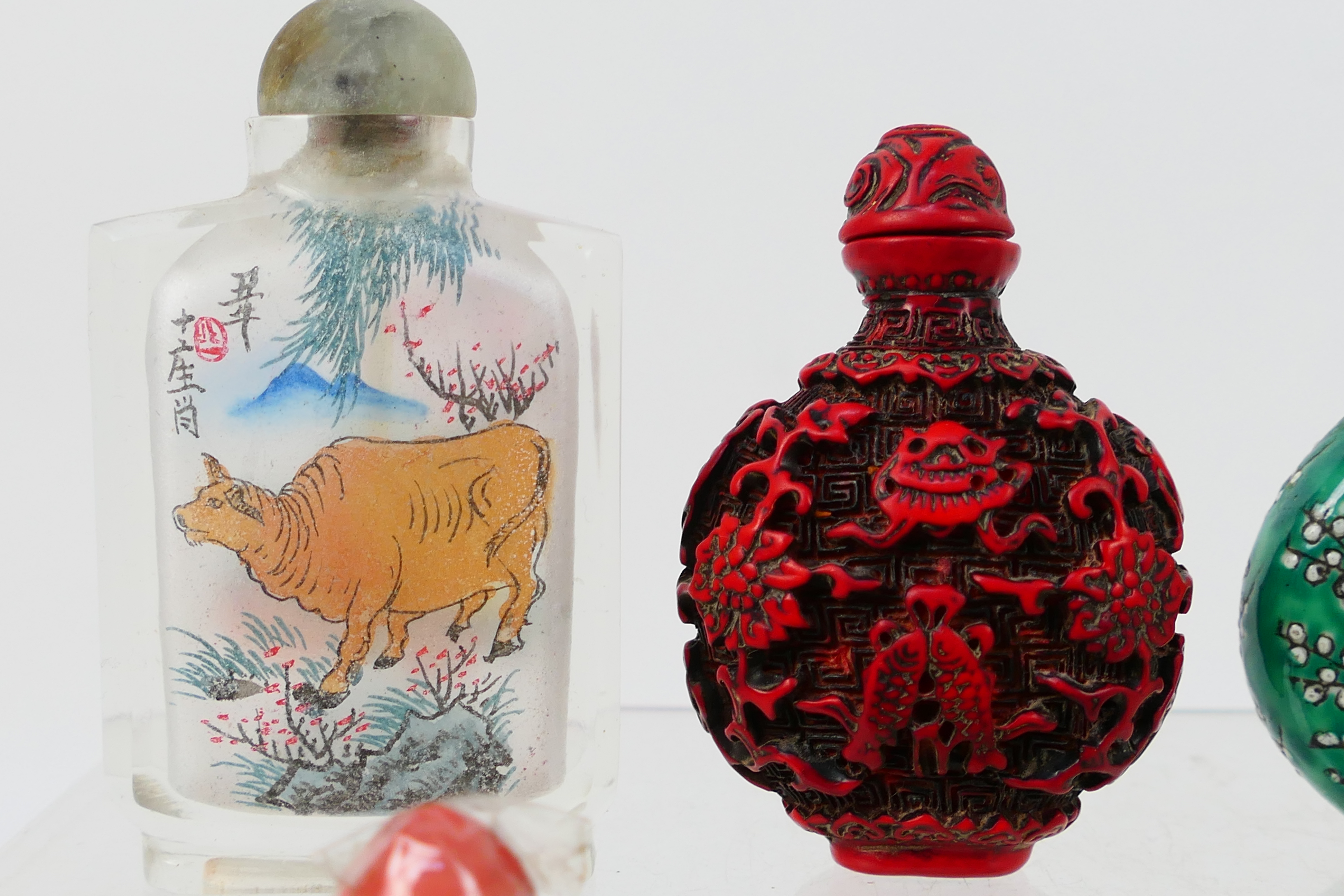 A collection of snuff bottles to include glass, ceramic and other. - Image 2 of 14