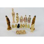 A collection of Asian figures to include Fu, Lu and Shou, Budai and similar,