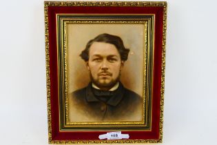 A framed oil on board portrait depicting a bearded gentleman,