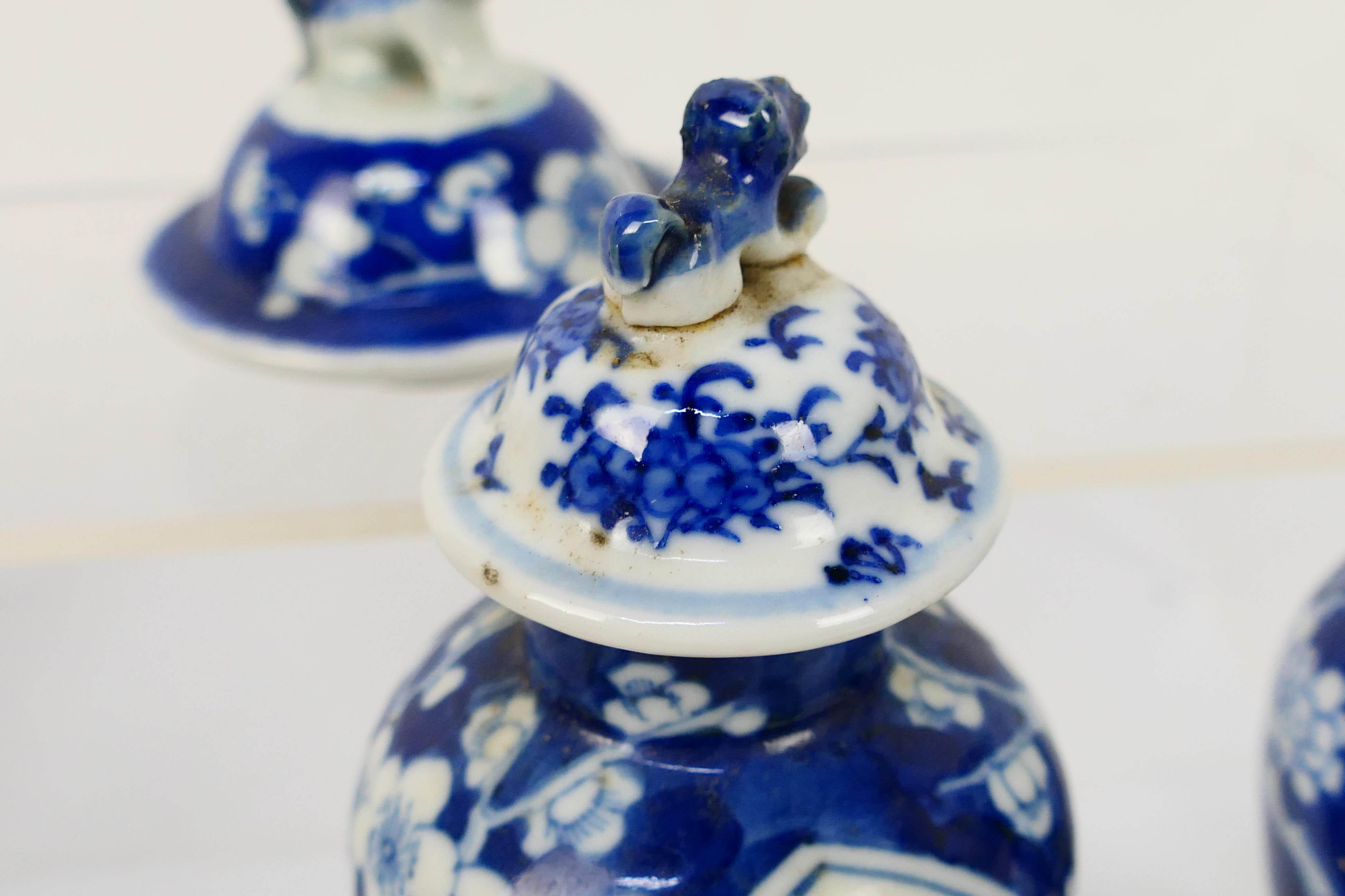 A group of 19th Century blue and white Chinese pottery covered vases of varying heights ranging - Image 20 of 36