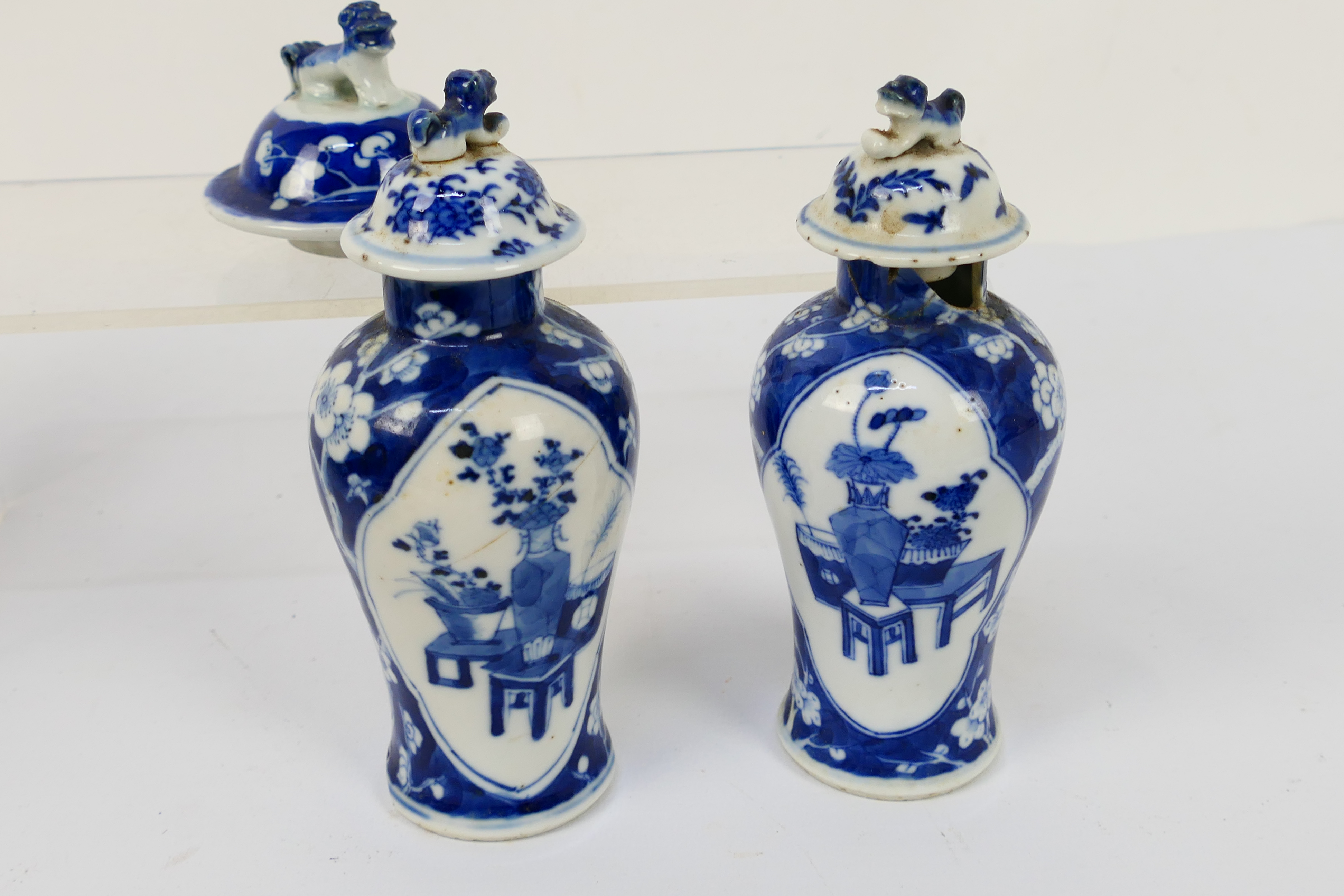 A group of 19th Century blue and white Chinese pottery covered vases of varying heights ranging - Image 19 of 36