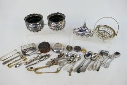 A collection of metal and plated ware to include trinket boxes, flatware and similar.