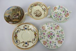 A 19th century Prattware paste pot The Travellers Rest and two soup bowls and saucers,