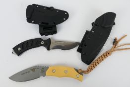 Two knives comprising a Tops Cheetah XL with 10 cm (l) curved blade and contained in kydex sheath