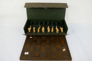 A Studio Anne Carlton Roman themed chess set with 10.5 cm (h) king. [2].