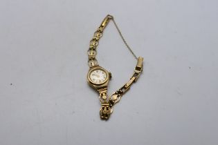 A lady's 9ct gold cased Avia wrist watch on 9ct gold bracelet, 8.6 grams excluding movement.