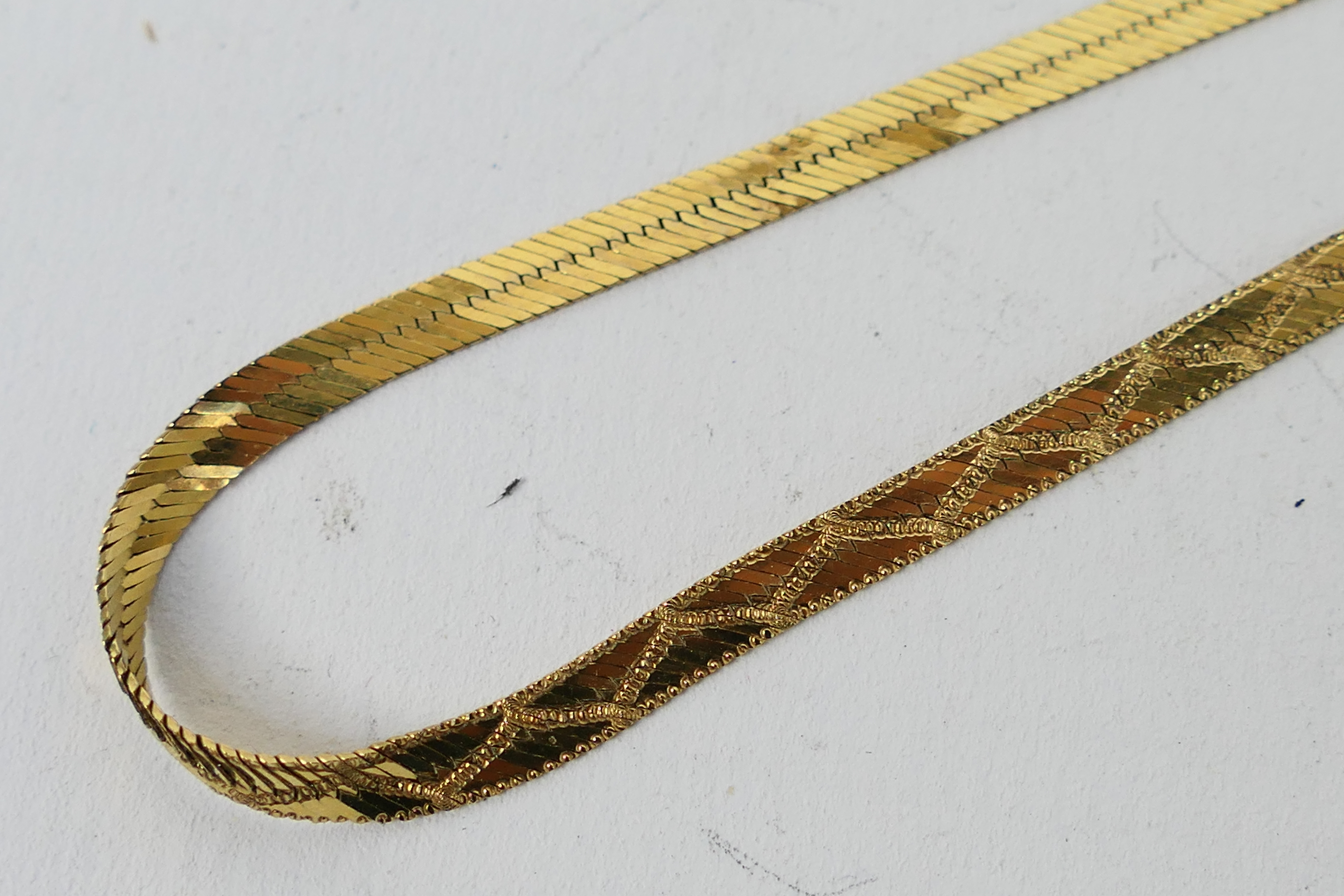 A yellow metal necklace stamped .375 (9 carat), approx 44 cm (length), approx weight 5. - Image 4 of 4