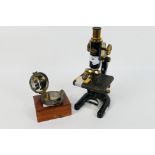 A W R Prior & Co London black lacquer and brass monocular microscope and a compass marked Stanley