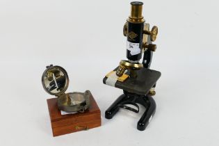 A W R Prior & Co London black lacquer and brass monocular microscope and a compass marked Stanley