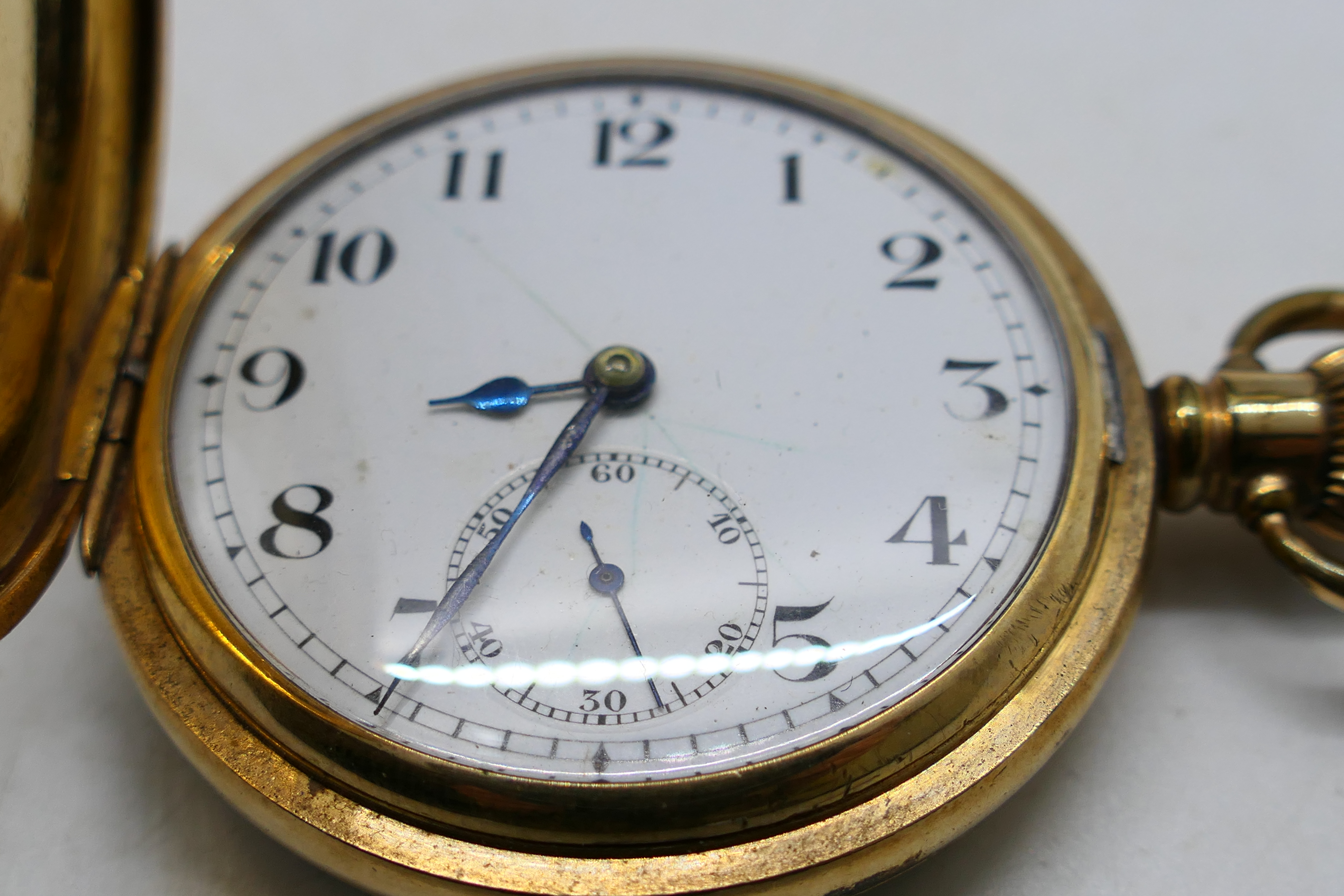 A gold plated half hunter pocket watch, Roman numerals to a white enamel dial, - Image 7 of 9