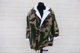 A World War Two (WW2 / WWII) style group comprising German eastern front reversible parka,