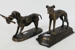 Two bronzed cast iron figures of dogs comprising a greyhound and a retriever,