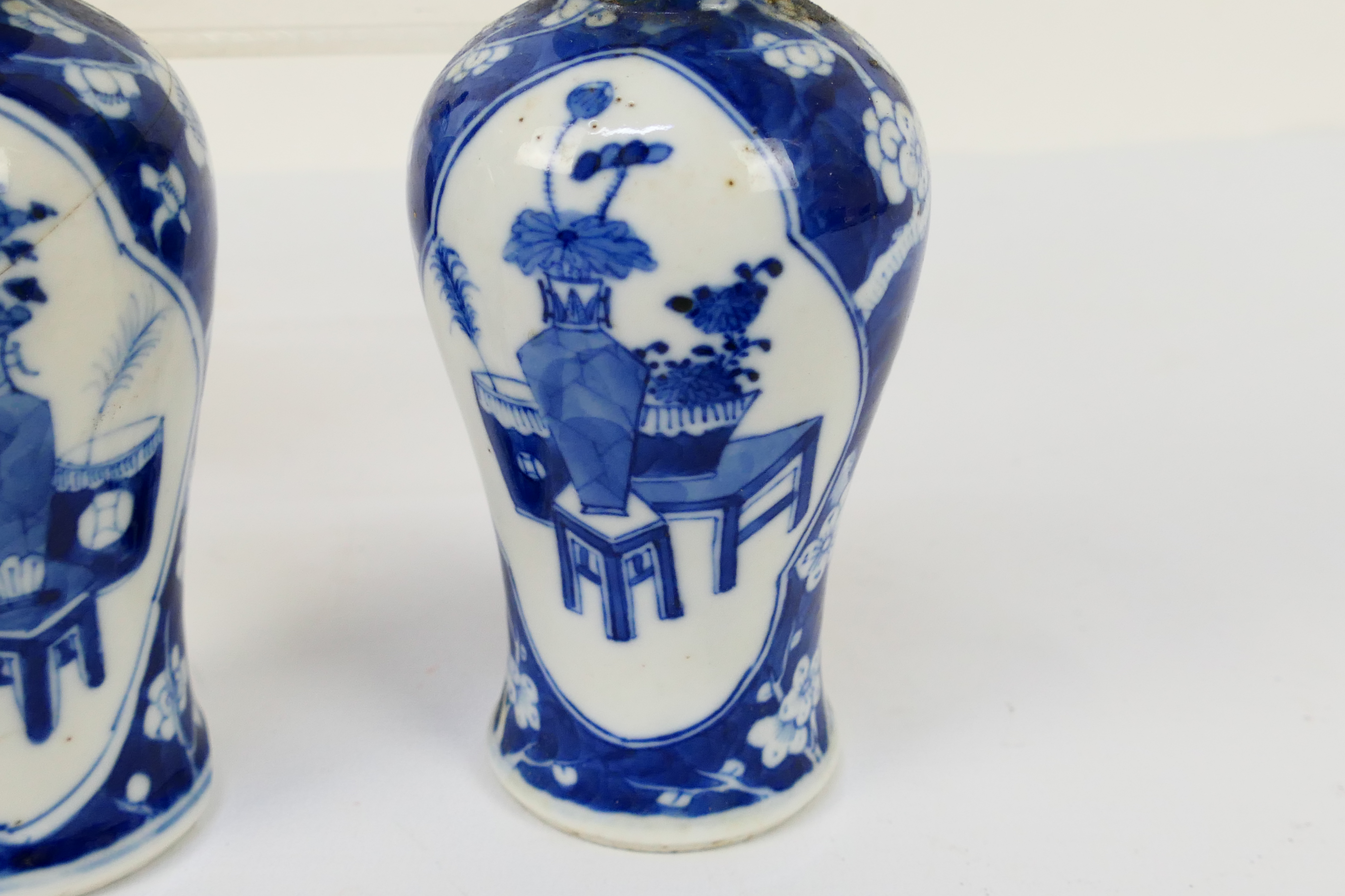 A group of 19th Century blue and white Chinese pottery covered vases of varying heights ranging - Image 22 of 36