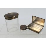 Lot to include a silver snuff box, Birmingham assay 1947 and two silver lidded dressing table jars,