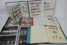 Philately - A collection of binders and stockbooks containing UK and foreign stamps, Cinderellas,