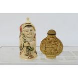 A carved bone snuff bottle in the form of a sage, 9 cm (h) and one other.