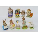 A group of nine Beatrix Potter figures, eight Beswick and one Royal Albert,