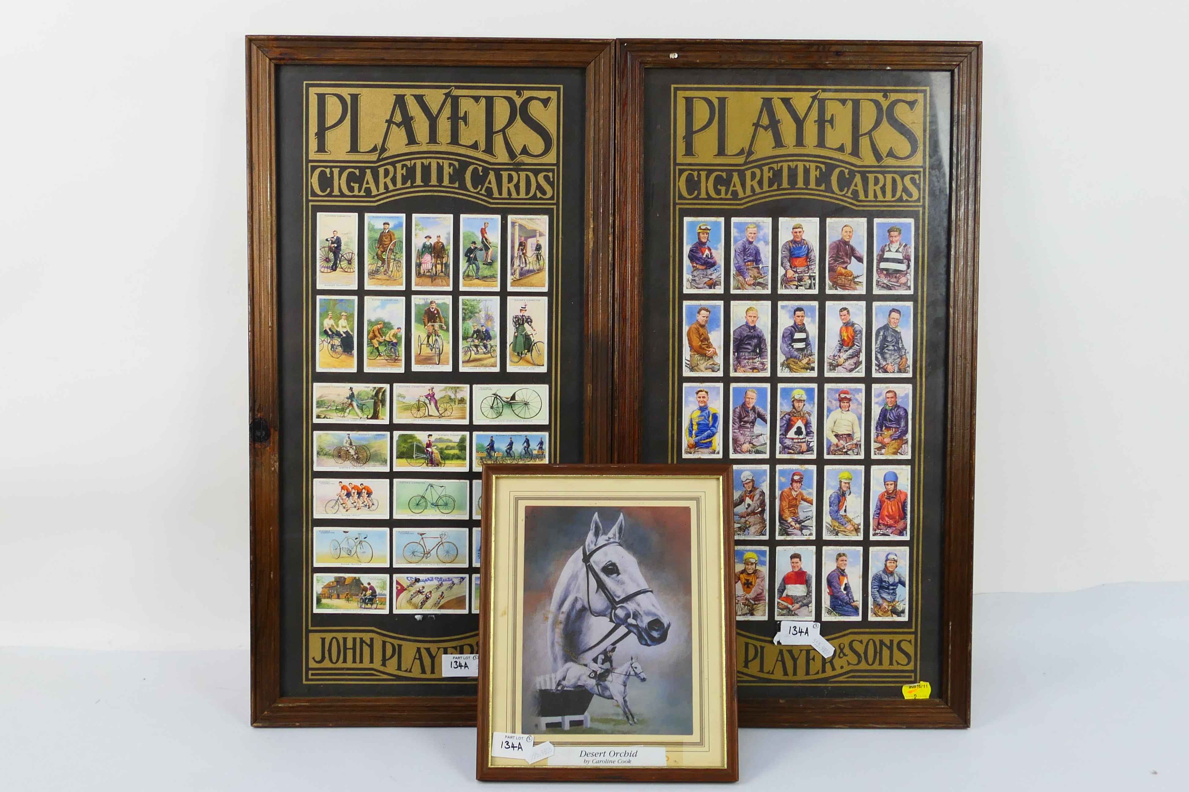 Two framed and glazed displays of John P
