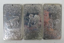 Three Chinese white metal trade tokens /