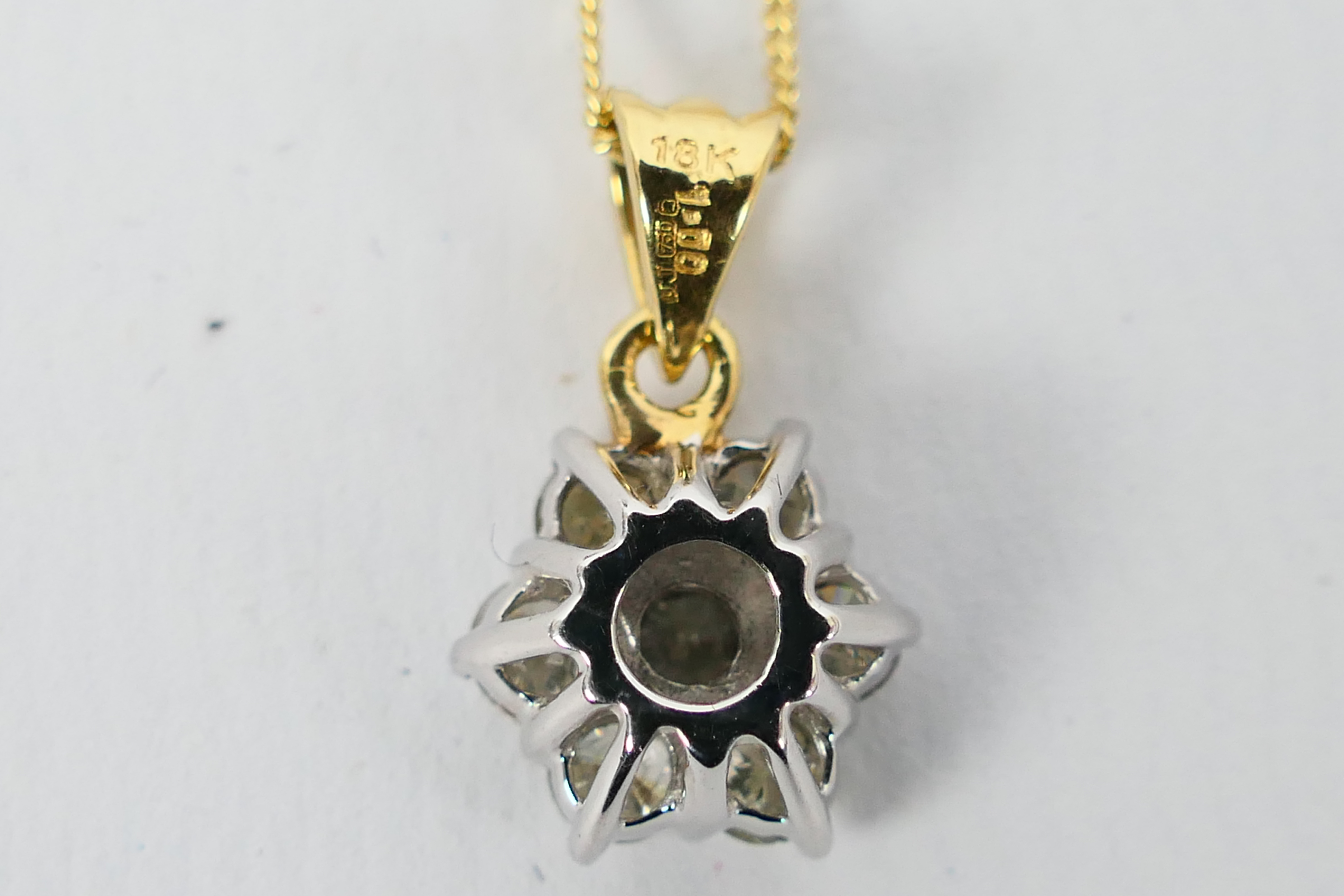 An 18ct white gold Diamond pendant conta - Image 6 of 8
