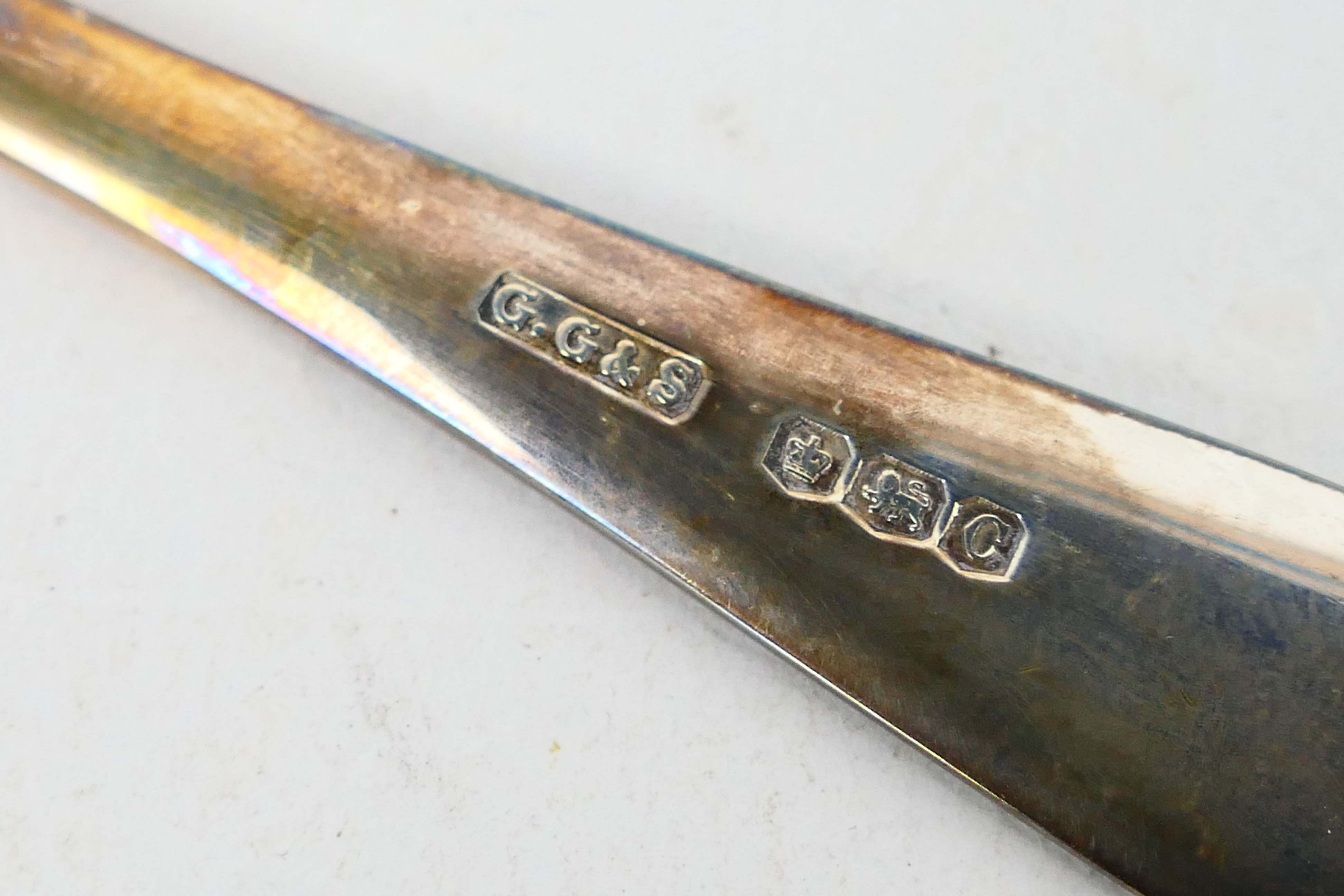 A George V hallmarked silver spoon and p - Image 3 of 6
