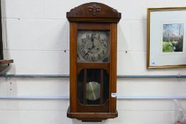 A vintage wall clock. [W]