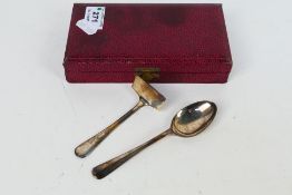 A George V hallmarked silver spoon and p