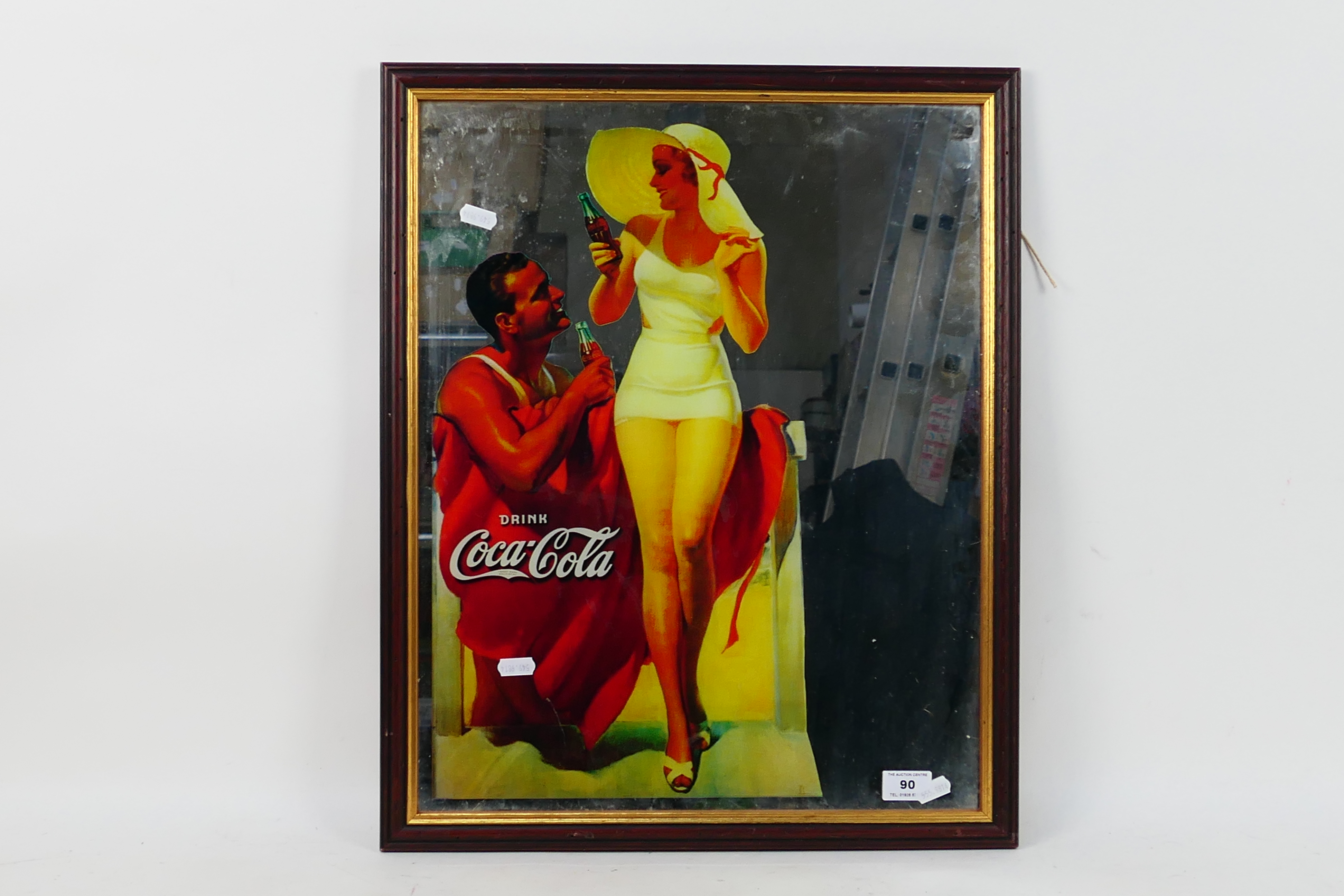 A Coca Cola advertising wall mirror, 55