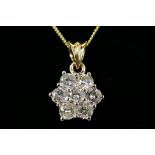 An 18ct white gold Diamond pendant conta