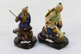 Two Shiwan pottery figures, each mounted