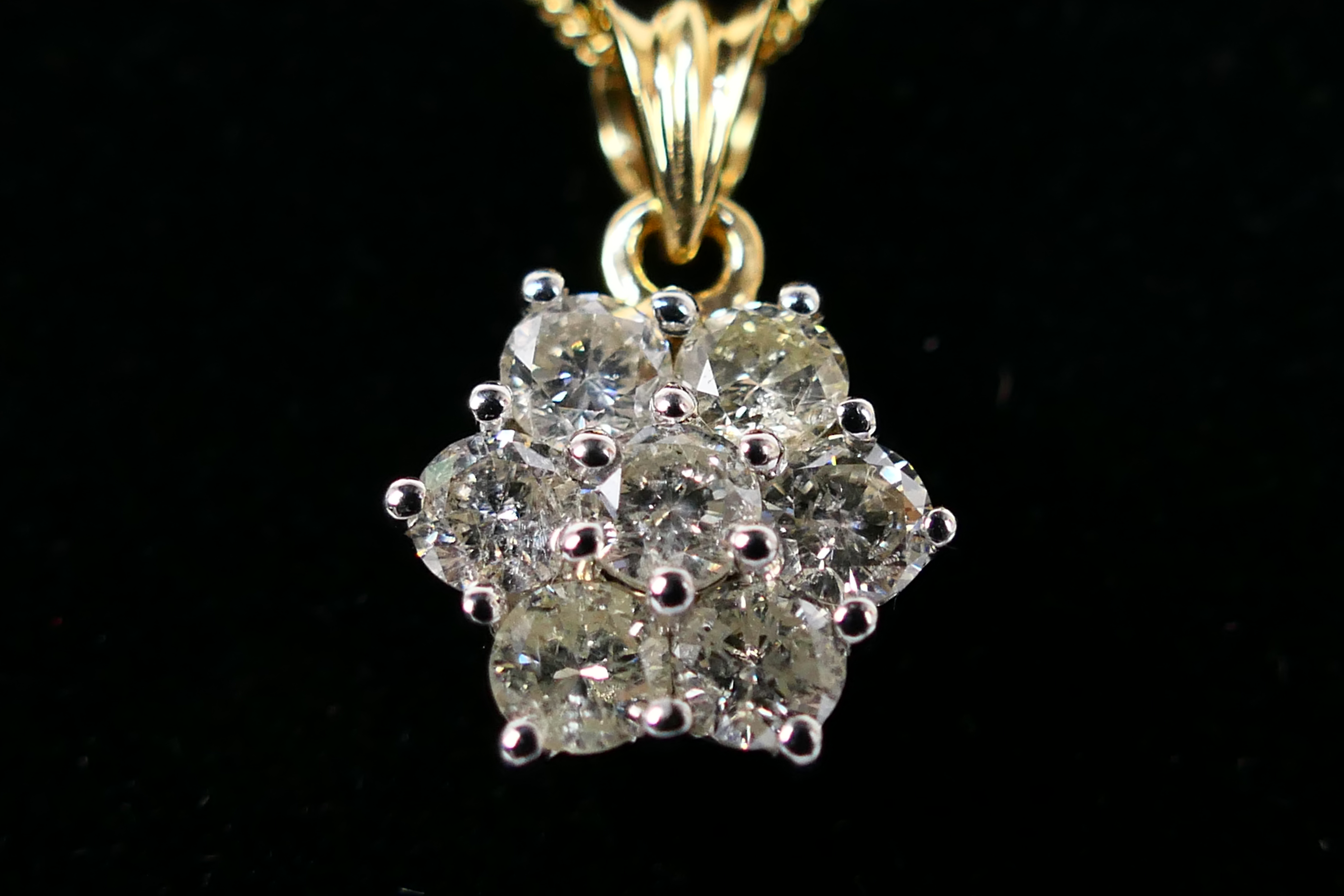 An 18ct white gold Diamond pendant conta - Image 2 of 8