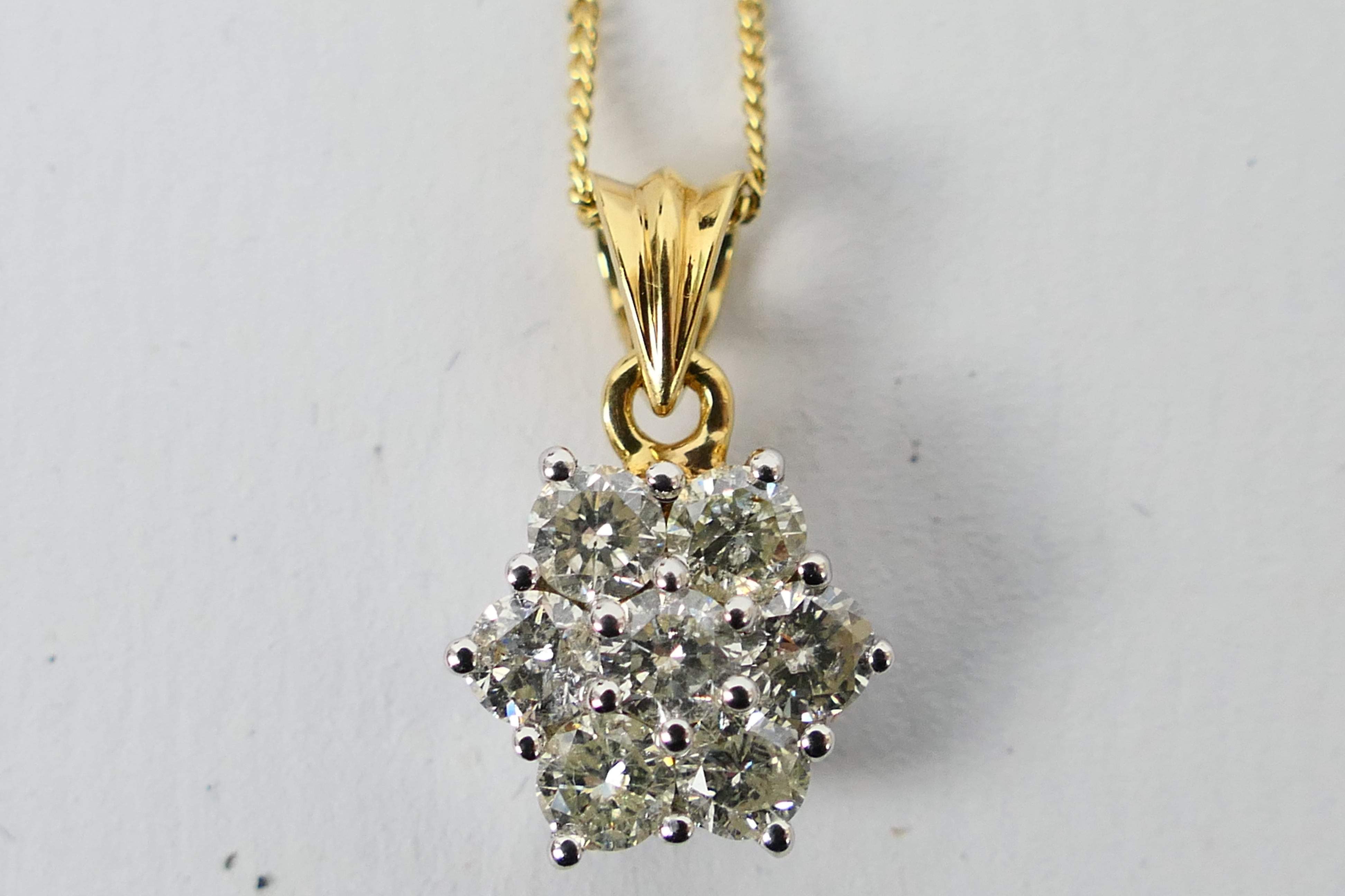 An 18ct white gold Diamond pendant conta - Image 5 of 8