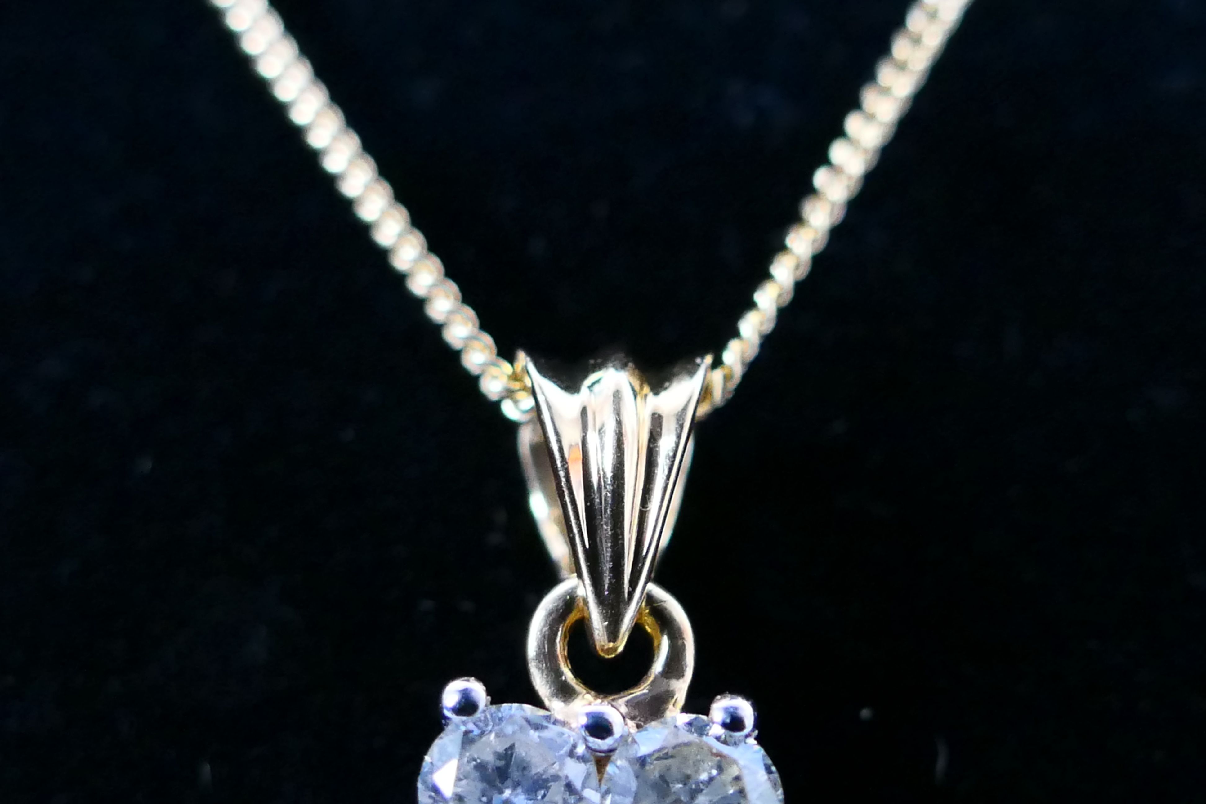 An 18ct white gold Diamond pendant conta - Image 3 of 8