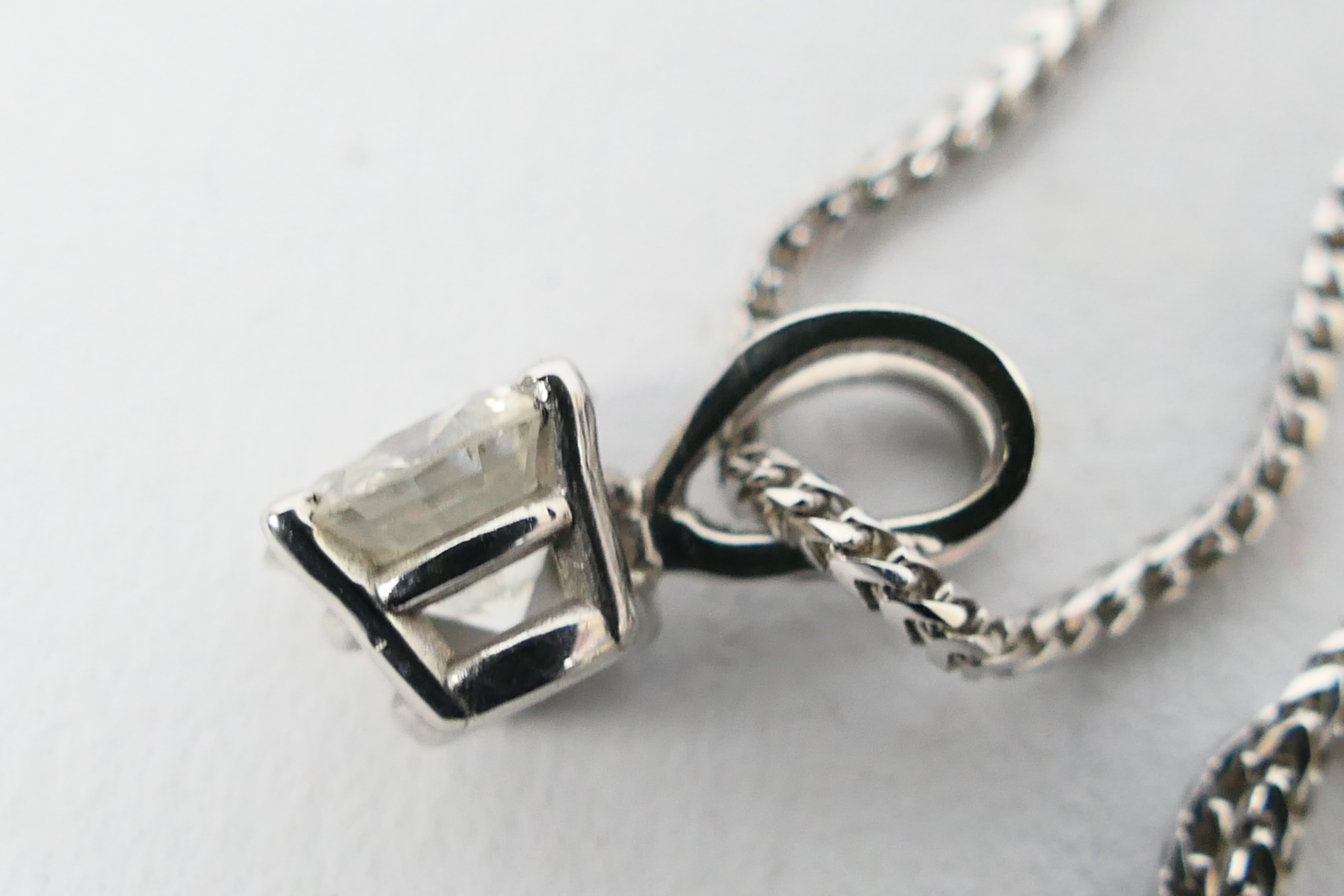 An 18ct white gold Diamond pendant conta - Image 3 of 4